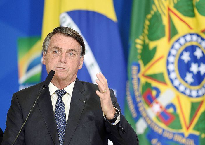 El presidente de Brasil, Jair Bolsonaro, insiste en la reapertura del comercio en todo el país, pese a que su país se posiciona como el segundo más afectado por la pandemia. AFP