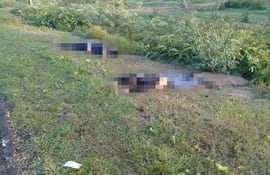 Los cuerpos estaban al costado de un camino rural de General Aquino.