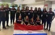 Selección paraguaya de balonmano femenino, cuerpo técnico y directivo, ayer, en el Aeropuerto.