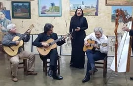 guido-cheaib-el-guitarrista-italiano-luciano-pompilio-gloria-del-paraguay-renato-belucci-y-rito-pedersen-en-la-casa-y-museo-mangore-de-san-juan-b-203410000000-1734673.jpg