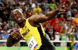 el-jamaiquino-usain-bolt-dando-rienda-suelta-a-su-alegria-luego-de-conquistar-su-tercera-medalla-de-oro-olimpica-en-serie-asi-gano-su-octava-medall-00601000000-1490934.jpg