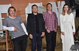 Brad Pitt, Leonardo DiCaprio, el director Quentin Tarantino y Margot Robbie.