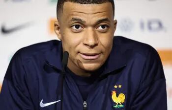 France's forward Kylian Mbappe speaks during a press conference at the Groupama Stadium in Decines-Charpieu, near Lyon, on March 22, 2024, on the eve of the friendly football match between France and Germany. (Photo by FRANCK FIFE / AFP)