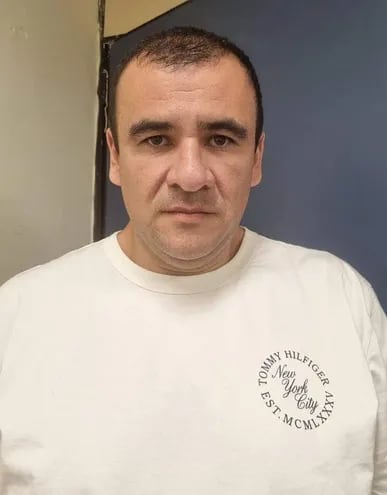 This handout picture released by the Paraguayan National Anti-Drug Secretariat (SENAD) shows Paraguayan Miguel Insfran aka "Tio Rico" after his arrest in Rio de Janeiro on February 9, 2023. - The Brazilian Federal Police arrested Paraguayan Miguel Insfran, one of the alleged masterminds of the murder of the Paraguayan anti-mafia prosecutor Marcelo Pecci in May 2022.



Paraguayan Miguel Insfran for being allegedly involved in the murder of Paraguayan anti-Mafia prosecutor Marcelo Pecci in May 2022 in Colombia, an official source said. (Photo by Handout / Secretaria Nacional Antidrogas Paraguay (SENAD) / AFP) / RESTRICTED TO EDITORIAL USE - MANDATORY CREDIT "AFP PHOTO /  HANDOUT / SENAD " - NO MARKETING - NO ADVERTISING CAMPAIGNS - DISTRIBUTED AS A SERVICE TO CLIENTS