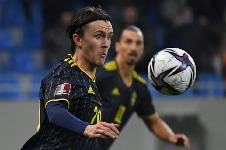 (FILES) Sweden's midfielder Kristoffer Olsson eyes the ball during the FIFA World Cup Qatar 2022 qualification football match between Georgia and Sweden in Batumi on November 11, 2021. Sweden's Kristoffer Olsson has been hospitalised over an unidentified brain illness and put on a ventilator, his club FC Midtjylland said On February 27, 2024. (Photo by Vano SHLAMOV / AFP)