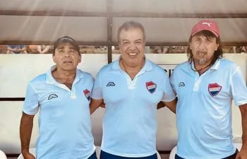 Juan Manuel Battaglia (izq.), Robert Pereira Molina y Eumelio Ramón Palacios, en el cuerpo técnico liderado por RPM.