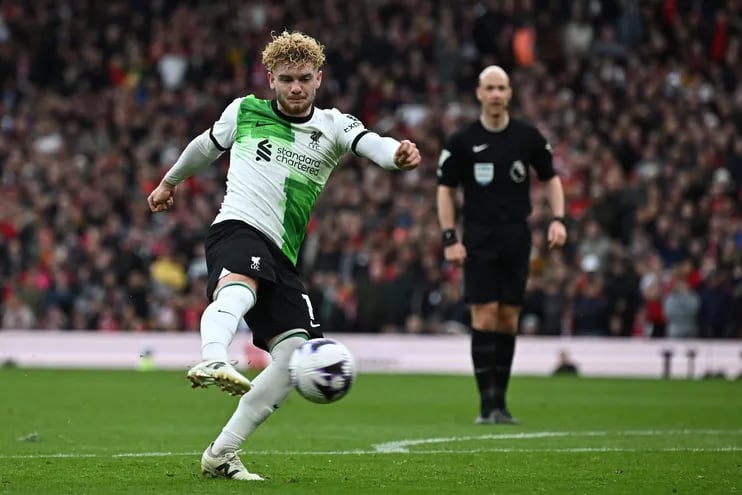 Liverpool's English midfielder #19 Harvey Elliott has an unsuccessful shot during the English Premier League football match between Manchester United and Liverpool at Old Trafford in Manchester, north west England, on April 7, 2024. (Photo by Paul ELLIS / AFP) / RESTRICTED TO EDITORIAL USE. No use with unauthorized audio, video, data, fixture lists, club/league logos or 'live' services. Online in-match use limited to 120 images. An additional 40 images may be used in extra time. No video emulation. Social media in-match use limited to 120 images. An additional 40 images may be used in extra time. No use in betting publications, games or single club/league/player publications. / 