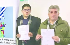 brian-martinez-jara-i-y-luis-osvaldo-sanchez-gonzalez-recibieron-oficialmente-refugio-en-el-uruguay--220324000000-1630109.jpg