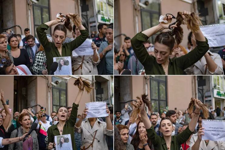 Nasibe Samsaei, una mujer iraní que vive en Turquía, se corta el pelo durante una protesta en las afueras del consulado iraní en Estambul, Turquía, en protesta por la muerte de Mahsa Amini, 22,luego de su arresto por la Policía de la Moral.