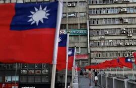 Banderas de Taiwánan ondean en Taipéi. China Popular asegura que la reunificación está muy cerca. (EFE/EPA)