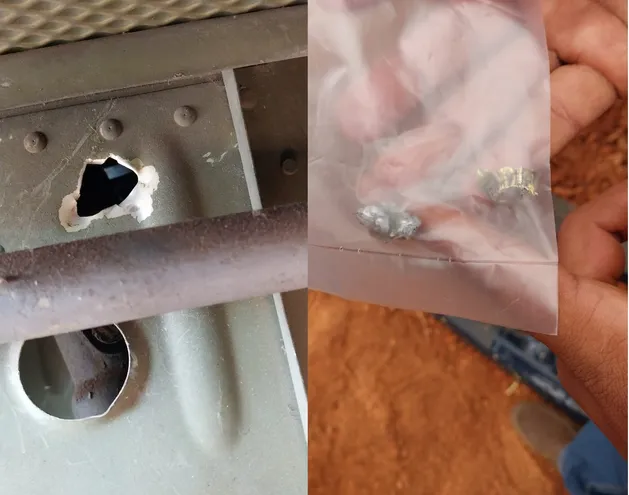 En la imagen, se muestran el agujero del proyectil y la bala encontrada en el interior del helicóptero atacado por los reclusos ayer.