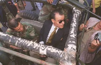 Juan Ruiz Díaz, detenido tras el atentado contra su jefe, el General en situación de retiro, Ramón Rosa Rodríguez, en el Jeep en el que posteriormente lograría asesinar al titular de la dinar.