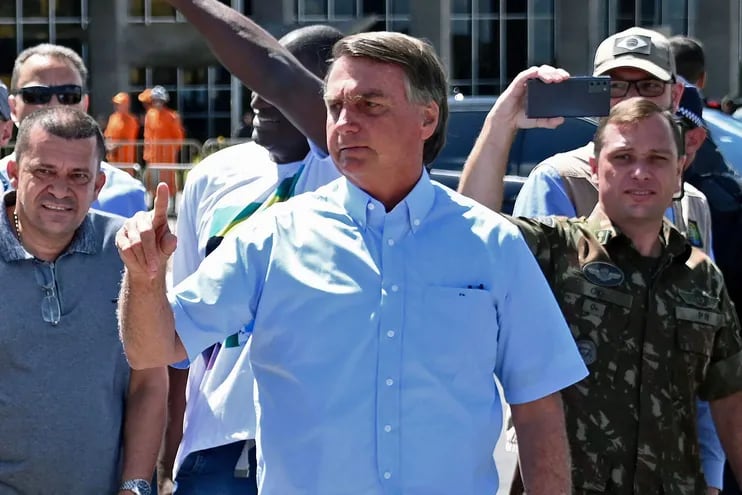 El expresidente de Brasil, Jair Bolsonaro (C), durante un acto público en Brasilia. (AFP)