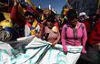 Indígenas protestan en las calles de Quito durante este martes, cuando se cumplen 16 días de protestas convocadas por los indígenas contra la carestía de la vida y el gobierno de Guillermo Lasso.