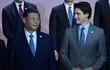 El presidente chino Xi Jingping y el primer ministro canadiense Justin Trudeau.