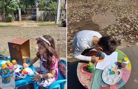 Los pequeños Piero y Paz Codas pintan en sus veredas y regalan sus pequeñas obras de arte a los vecinos.