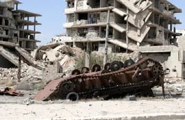 la-guerra-civil-siria-iniciada-a-principios-de-2011-tuvo-este-ano-un-momento-culminante-con-la-ofensiva-gubernamental-decisiva-apoyada-por-fuerzas-192205000000-1788883.jpg