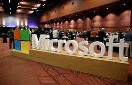 (FILES) The Microsoft logo at the Microsoft Annual Shareholders Meeting in Bellevue, Washington, on November 30, 2016. Xbox maker Microsoft closed its blockbuster acquisition of Activision Blizzard, whose video games include "Call of Duty" and "Candy Crush", sealing one of the biggest technology tie-ups in history after overcoming final hurdles on October 13, 2023. (Photo by Jason Redmond / AFP)