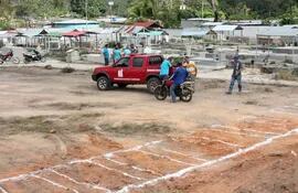 trabajadores-preparan-el-terreno-para-el-entierro-de-17-mineros-en-tumeremo-municipio-de-sifontes-en-el-estado-de-bolivar-el-crimen-paso-al-terren-200642000000-1439487.jpg