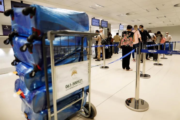 Pasajero se preparan para el embarque en el aeropuerto internacional Silvio Pettirossi.