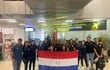 La delegación completa de la selección paraguaya femenina de rugby seven –las Yacaré– ayer en el aeropuerto Silvio Pettirossi.