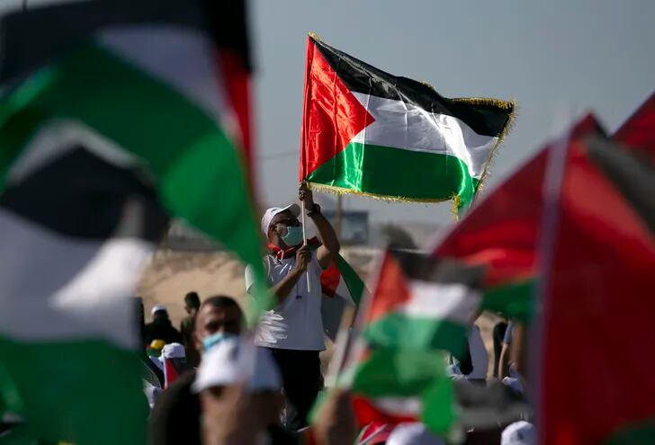 Manifestantes palestinos durante una protesta en Jericó, este lunes.
