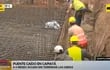 Puente de Capiatá sigue sin terminarse y obreros hacen lo que pueden. (captura de ABC TV).