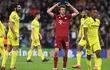 La alegría de los jugadores del Villarreal contrasta con la reacción del jugador alemán Thomas Müller, del Bayern Munich, al finalizar el encuentro.