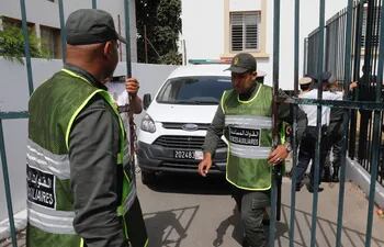 A van carrying the suspects of murdering two Scandinavian hikers in Morocco leaves the court house in Sale on July 11, 2019. - The trial of the suspected jihadist killers of two Scandinavian women hikers beheaded in Morocco's High Atlas mountains last December neared its close today as lawyers prepared to deliver their final arguments. Prosecutors have called for the death penalty for the three main jihadist suspects behind the "bloodthirsty" murder of the young Scandinavians. (Photo by - / AFP)