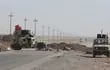 vehiculos-militares-toman-posicion-en-suleiman-bek-a-unos-300-kilometros-al-norte-de-baghdad-irak--235949000000-1132561.JPG