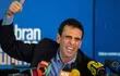 el-dos-veces-candidato-presidencial-henrique-capriles-en-la-reunion-de-prensa-que-convoco-ayer-afp-201102000000-1283717.jpg