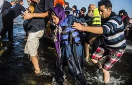 llegada-de-inmigrantes-a-la-costa-griega-92058000000-1384436.JPG