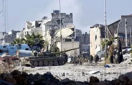 fuerzas-gubernamentales-avanzan-en-uno-de-los-distritos-de-alepo-ciudad-bastion-de-los-rebeldes-en-siria-afp-194736000000-1529930.jpg