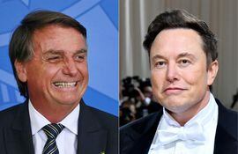 El presidente de Brasil, Jair Bolsonaro (i) y el empresario e ingeniero jede de SpaceX, Elon Musk (d). (AFP)