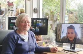 Joy Milne, y en la pantalla del ordenador a la investigadora Perdita Barran.Edimburgo (R.Unido).