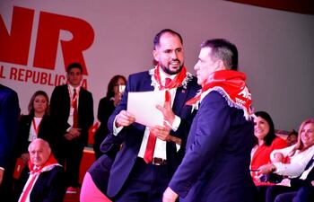 Santiago Brizuela y Horacio Cartes.