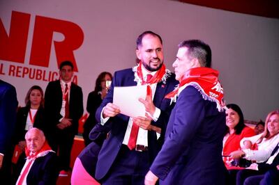 Santiago Brizuela y Horacio Cartes.