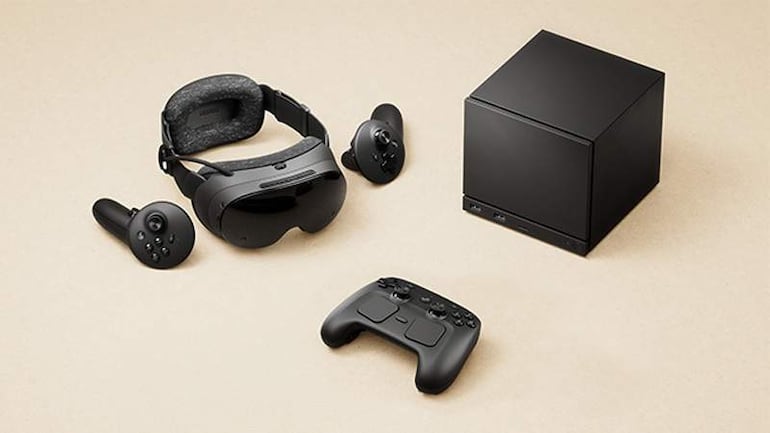 Dispositivos electrónicos de realidad virtual y controladores de Valve organizados sobre una superficie clara, en entorno tecnológico.