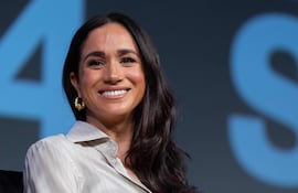 “¡Estamos nominados a un Emmy en la categoría de Mejor Serie de Estilo de Vida!“, anunció feliz Meghan Markle. (SUZANNE CORDEIRO / AFP)