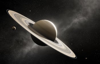 Saturno con sus lunas principales.