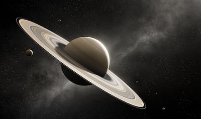 Saturno con sus lunas principales.