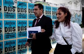 Jana Maradona, daughter of the late Argentine football legend Diego Maradona, and her lawyer Felix Linfante leave the San Isidro court following a hearing, in San Isidro, Buenos Aires province, Argentina, on March 25, 2025. Seven medical professionals who cared for Argentine football legend Diego Maradona during his final days go on trial accused of criminal negligence over his death. Maradona died on November 25, 2020 aged 60 while recovering from brain surgery for a blood clot, after decades battling cocaine and alcohol addictions. (Photo by Tomas CUESTA / AFP)