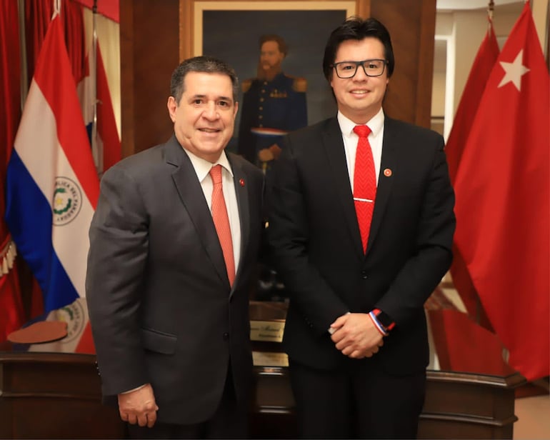Horacio Cartes y Edgar Torres.