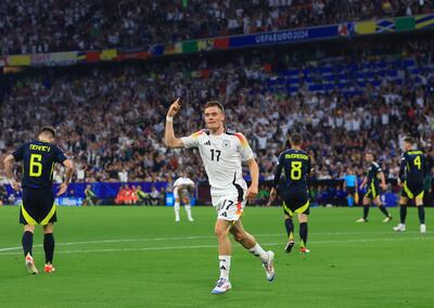 Munich (Germany), 14/06/2024.- Florian Wirtz of Germany celebrates scoring the opening goal during the UEFA EURO 2024 group A match between Germany and Scotland in Munich, Germany, 14 June 2024. (Alemania) EFE/EPA/MARTIN DIVISEK