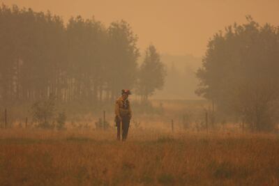 Sturgeon Lake (Canada), 08/06/2023.- A handout photo made available by Alberta Wildfire showing a firefighter at one of scores of wildfires burning across multiple Canadian Provinces in Sturgeon Lake Cree Nation, Alberta, Canada, 08 June 2023. Smoke from the ongoing Canadian wildfires continues to impact air quality conditions across multiple major US cities. (Incendio) EFE/EPA/ALBERTA WILDFIRE HANDOUT HANDOUT EDITORIAL USE ONLY/NO SALES