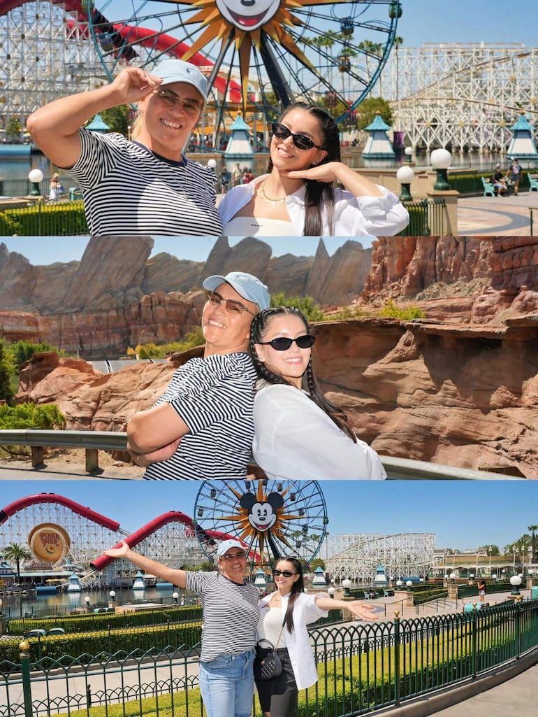 Dos mujeres sonrientes, una con camiseta a rayas y otra con camisa blanca, posan en Pixar Pier bajo un cielo soleado.
