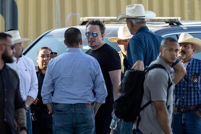 EAGLE PASS, TEXAS - SEPTEMBER 28: Tech entrepreneur Elon Musk with Rep. Tony Gonzales (R-TX) while visiting the Texas-Mexico border on September 28, 2023 in Eagle Pass, Texas. Musk toured the border along the bank of the Rio Grande to see firsthand the ongoing migrant crisis, which he has called a "serious issue." John Moore/Getty Images/AFP (Photo by JOHN MOORE / GETTY IMAGES NORTH AMERICA / Getty Images via AFP)