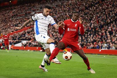 Atalanta's Italian forward #90 Gianluca Scamacca (L) vies with Liverpool's French defender #05 Ibrahima Konate during the UEFA Europa League quarter-final first leg football match between Liverpool and Atalanta at Anfield in Liverpool, north west England on April 11, 2024. (Photo by Darren Staples / AFP)