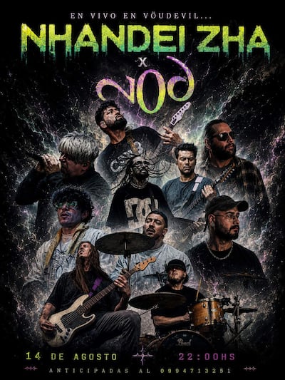 Músicos en acción durante concierto en Vöudevil, con guitarras y un ambiente festivo.