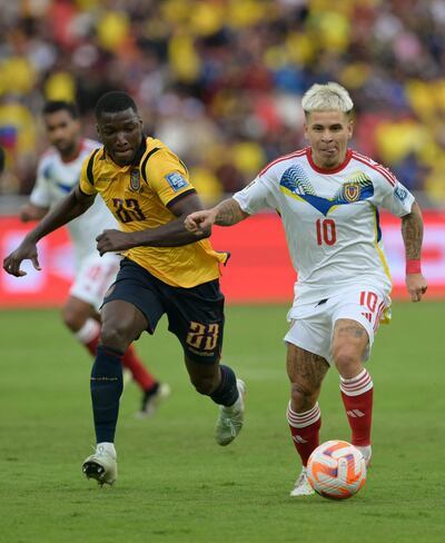 Venezuela's midfielder #10 Yeferson Soteldo controls the ball past Ecuador's midfielder #23 Moises Caicedo during the 2026 FIFA World Cup South American qualifiers football match between Ecuador and Venezuela, at the Rodrigo Paz Delgado stadium in Quito, on March 21, 2025. (Photo by Rodrigo BUENDIA / AFP)